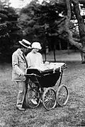Crown Prince Hirohito and Crown Princess Nagako with their first child, Princess Shigeko in 1926.