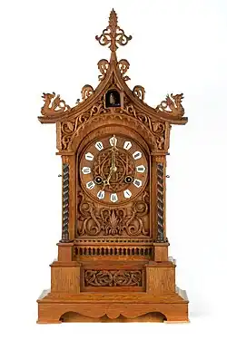 An eclectic style piece, combining Gothic and oriental decorative motifs, like the two dragons on its curved roof. Fürderer, Jaegler und Cie, Neustadt, c. 1880 (Deutsches Uhrenmuseum, Inv. 07–3772)