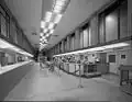 The main hall and lobby area before the restoration; The ceiling has been lowered, and the hall narrowed.