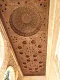 Wooden ceiling behind the portico