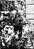 Remains of the Dioscuri mural at the entrance (left side of the mural).[13]