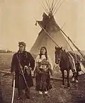 North-West Mounted Police scout wearing a buffalo coat. Gleichen, Alberta, ca. 1890