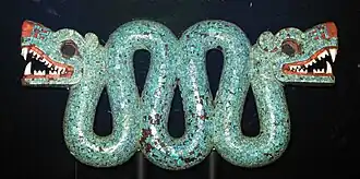 Double-headed serpent; 1450–1521; Spanish cedar wood (Cedrela odorata), turquoise, shell, traces of gilding & 2 resins are used as adhesive (pine resin and Bursera resin); height: 20.3&nbsp;cm (8.0&nbsp;in), width: 43.3&nbsp;cm (17.0&nbsp;in), depth: 5.9&nbsp;cm (2.3&nbsp;in); British Museum