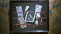 A trompe-l'œil still life of a letter rack, 54 x 67.3&nbsp;cm, includes a print after Staverenus