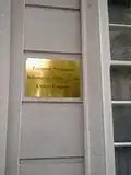 Plaque outside the mission