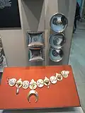 Rectangular and circular silver plates and equestrian furnishings