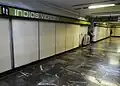 A lightly populated passageway indicating exits A and B.