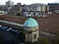 Archaeological excavations by the Museum of London in 2009, with the Radcliffe Infirmary building in the background
