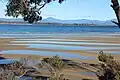 Low tide at Daniel's Bay, Lunawanna, showing characteristic tidal patterns in sand (2017)