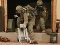 Note the Xbox 360 controller held by the operator