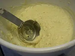 The dough is relatively wet, and cannot be shaped like a bread dough.