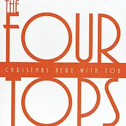 A white cover with the band name and album title in orange