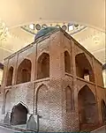 Restored red brick mausoleum, in 2016