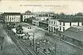 Tram rails in front of the station, on a postcard from 1916