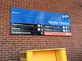 The directional platform signage attached to former ground level Platform 1, December 2015