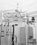 Lady Godiva assembly, with damaged supporting rods after the excursion of February 1954. Note the images are of different assemblies.[37]