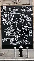 Painted boarded up storefront during the COVID-19 pandemic, SOHO NYC - 2020