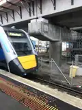 HCMT arriving into Platform 2 next to rail hybrid bridge under construction, November 2023