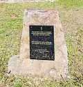 Dedication plaque next to the Church of Saint Nicholas in Habura
