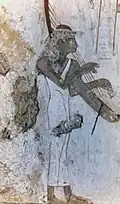 Naviform harp. Shoulder harp. Tomb of Nebamun, TT17.