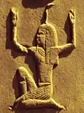 The deity Heh, symbol of eternity, Karnak, White Chapel of Senusret I.