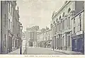 Rugby High Street in 1893, the building second to the right was the first Town Hall of 1857. Destroyed by fire in 1921.
