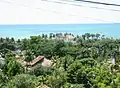 Distant view of historic center with sea behind