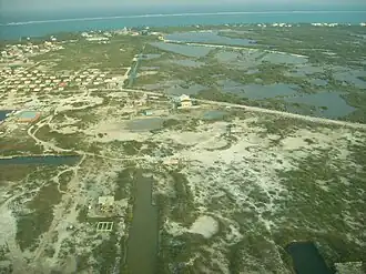 Houses in San Pedro and mangrove swamp