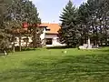 Municipal office and a small park with bust of Josef Lada