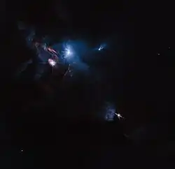 HH 30 (lower right) and XZ and HL Tauri on the upper left. Hubble ACS image.