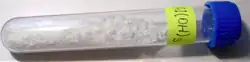 Sample of aluminium hydroxide in a vial
