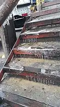 Icicles on stairs as a result of the freezing temperatures, it had rained the day before, 26&nbsp;°F/-3&nbsp;°C, Monterrey, Nuevo León, México