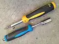 Multi-bit screwdriver and F connector tool.