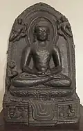 Buddha with small monkey at left; both have bowls.