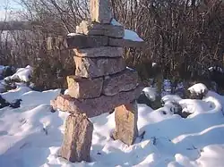 The inukshuk at Rideau Hall created by artist Kananginak Pootoogook for former Governor General of Canada, Roméo LeBlanc, for National Aboriginal Day, unveiled on 21 June 1997.