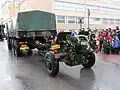 SA-240 towing a 122 mm howitzer