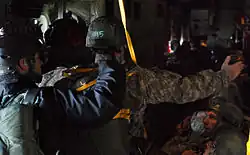 A Ranger from the 2nd Ranger Battalion instructs fellow soldiers in a Jump Master course at Joint Base Lewis-McChord, April 13, 2004