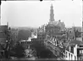 The demolition of houses on Herengracht for the construction of Raadhuisstraat (photo by Jacob Olie, April 1896). In the foreground, the filled-in Warmoesgracht.