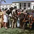 Kennedy feeds an elephant