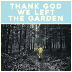The title in white text against a blue background above an otherwise black-and-white photograph of two people walking in a forest wearing yellow clothes, showing one tree with green leaves
