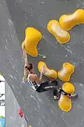 Pilz competing at the Bouldering World Cup in Munich, 2017