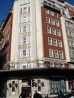 Nine-storey building with large doors on the corner