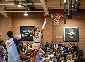 Lebron James Jr. laying up the basketball.
