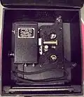 A Kodak Kodascope Eight Model 40 shown inside a Kodak carrying case. The case was made for models 20, 30 or 40.