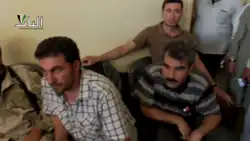 Muhammad Mustafa Ali (left) and Shervan Derwish (right) in Qabasin, July 2013, then as commanders of the Kurdish Front. They would later become commanders of the Northern Sun Battalion.