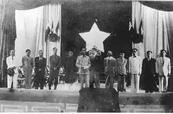 The National assembly of the Democratic Republic of Vietnam on 2 March 1946, supreme advisor Vĩnh Thụy (Bảo Đại), sixth from right to left, next to President Hồ Chí Minh (middle).