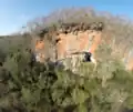 Lapa do Santo. Frontal view showing the cave entrance and sheltered area (drone).
