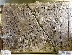 Lintel of Raiay, the King's scribe, and the first god's servant of Sopdu Nakht. Both stand before Osiris. 19th Dynasty. From Egypt. The Petrie Museum of Egyptian Archaeology, London