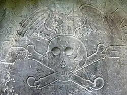 17thC tombstone in the mausoleum of John Livingstone, 'an apothecary in Edinburgh', who fell victim to the plague 1645