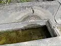 The fountain on the road of the village